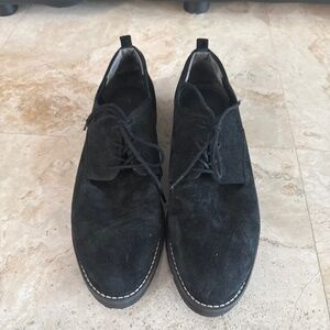 Black suede loafers